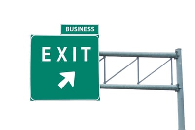 An exit sign, like you'd see on the highway, with "Business" added on the top. Indicating an exit for business owners.